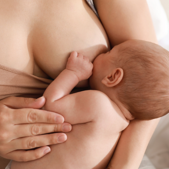 Mother breastfeeding baby